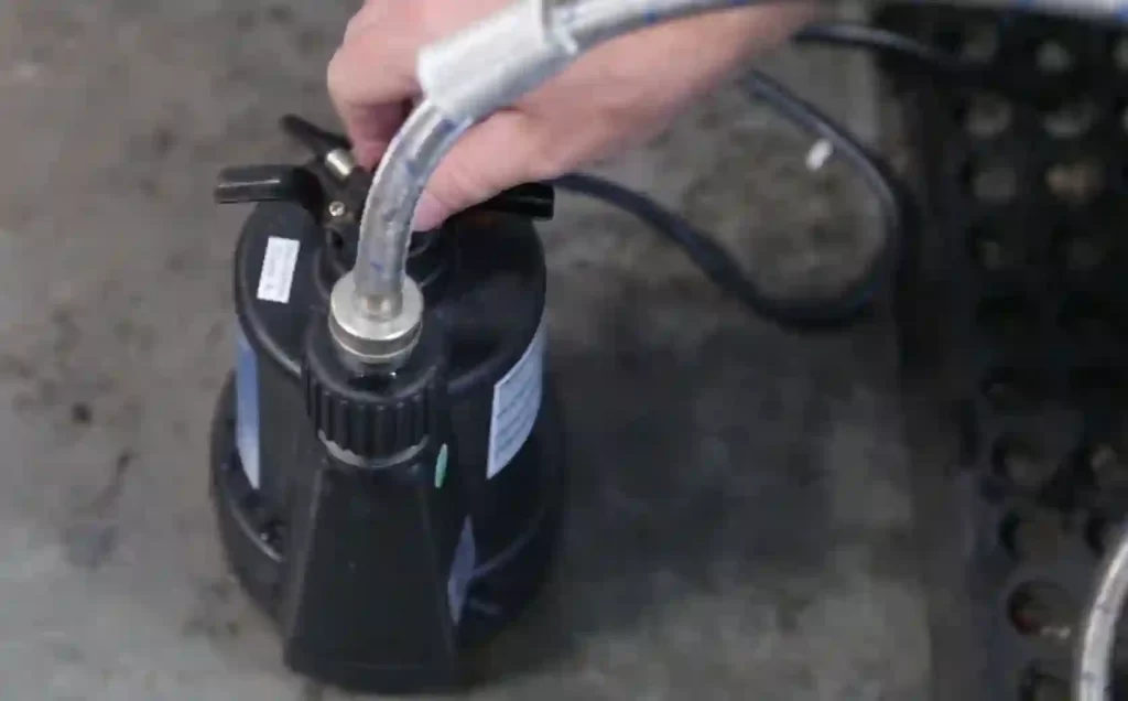 Attach a hose to the submersible pump