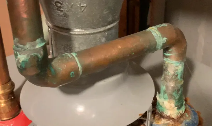 rust formation on top of the water heater