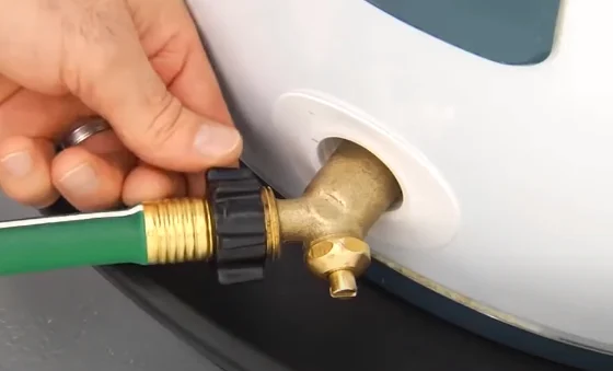 Attaching a garden hose to the drain valve