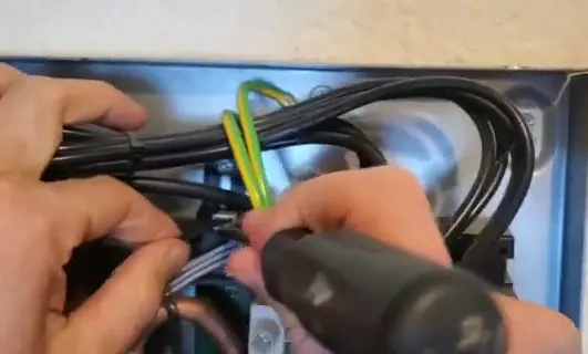 removing the wire connector from here at the top