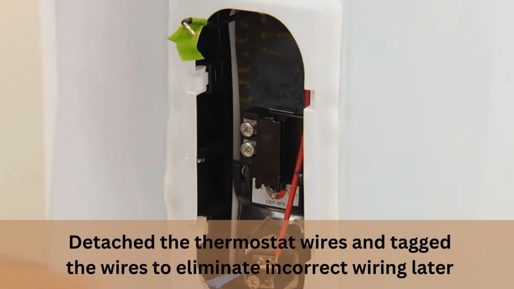 Detached the thermostat wires and tagged the wires to eliminate incorrect wiring later