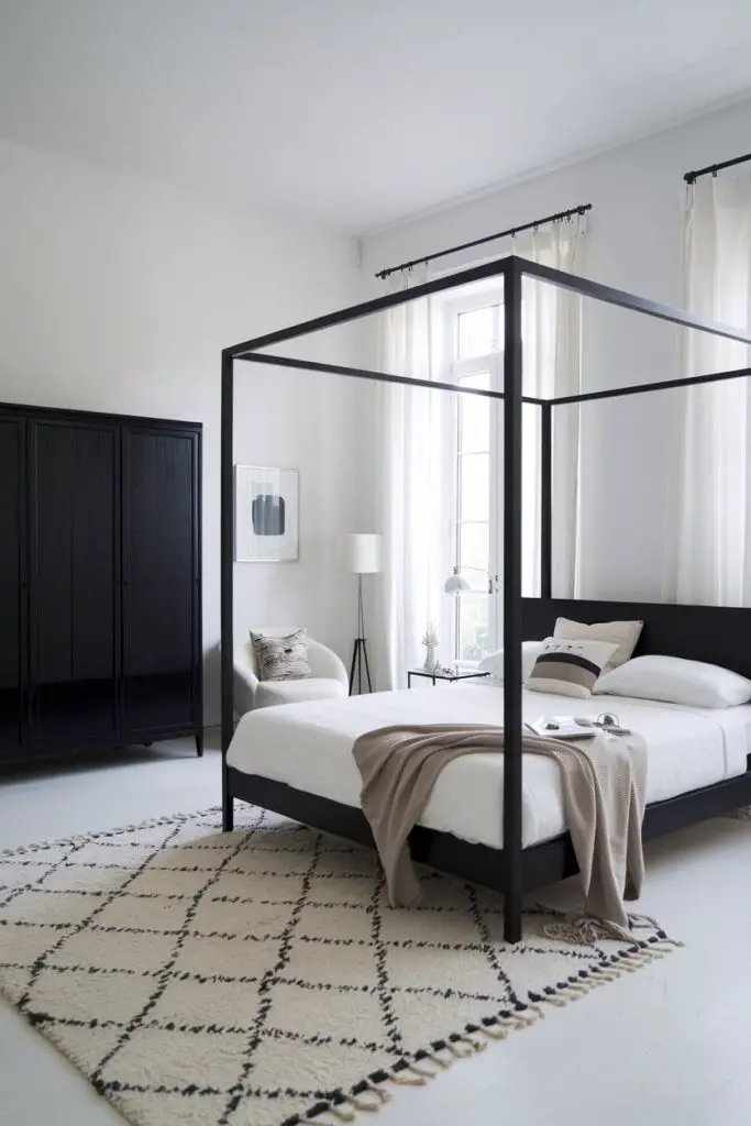 Feature Black Furniture in a Minimalist Space