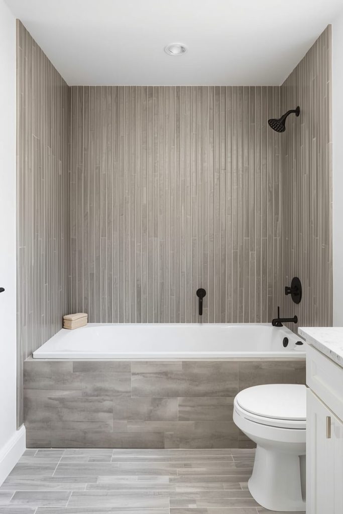 Dark Tile Bathroom With Tub