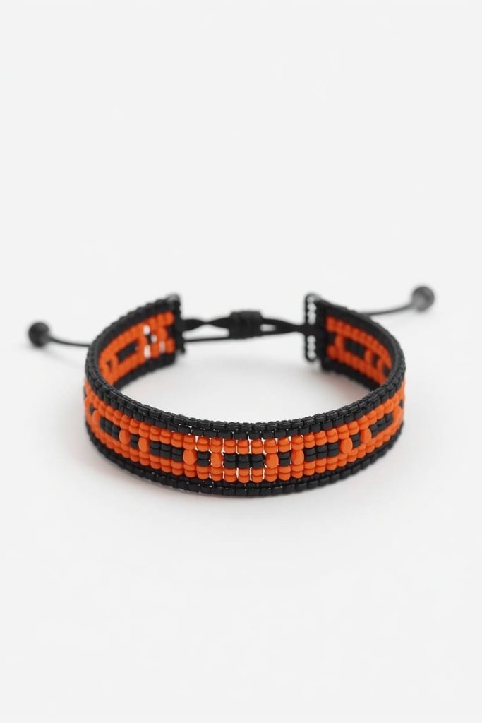 The Classic Orange-and-Black Single Stitch Cuff